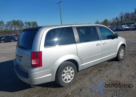 2010 Chrysler Town & Country Lx z USA, uszkodzony, nr VIN 2A4RR4DEXAR133232